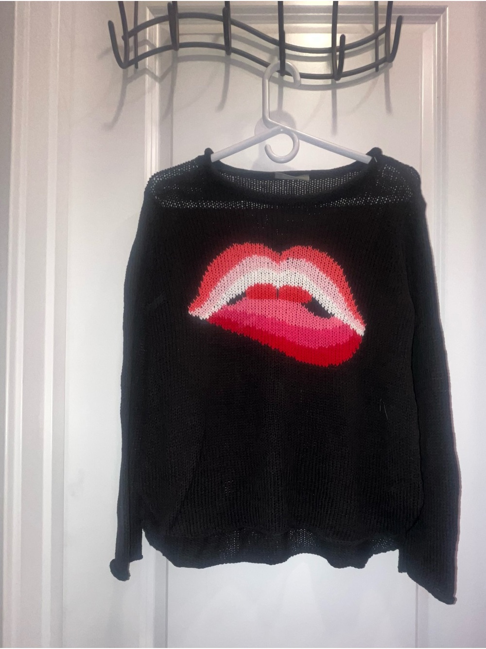 Wooden Ships smooch lips black sweater